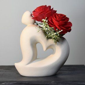 Sexy white curvy hearts vase with 4 red Sola wood roses that will last forever!